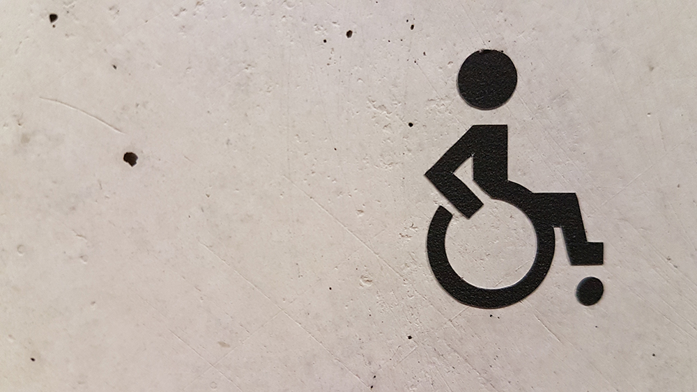 WC-symbol rullstolsburen person